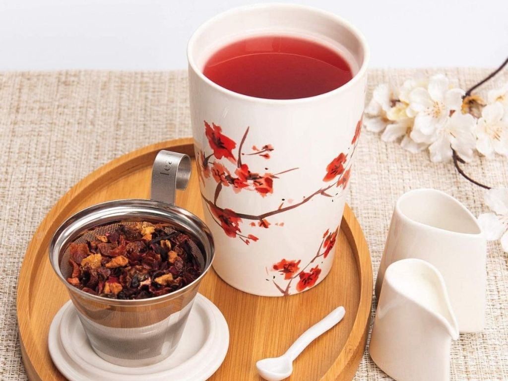 cherry blossoms tea infuser cup with lid on wood tray
