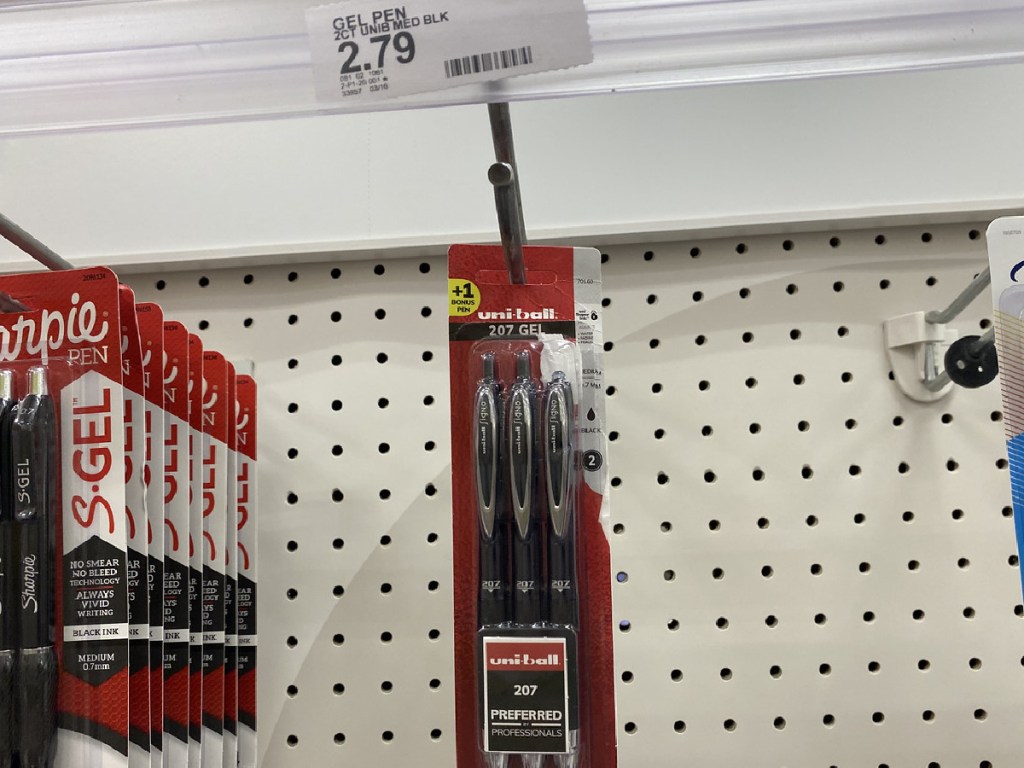 pens hanging on display in a store