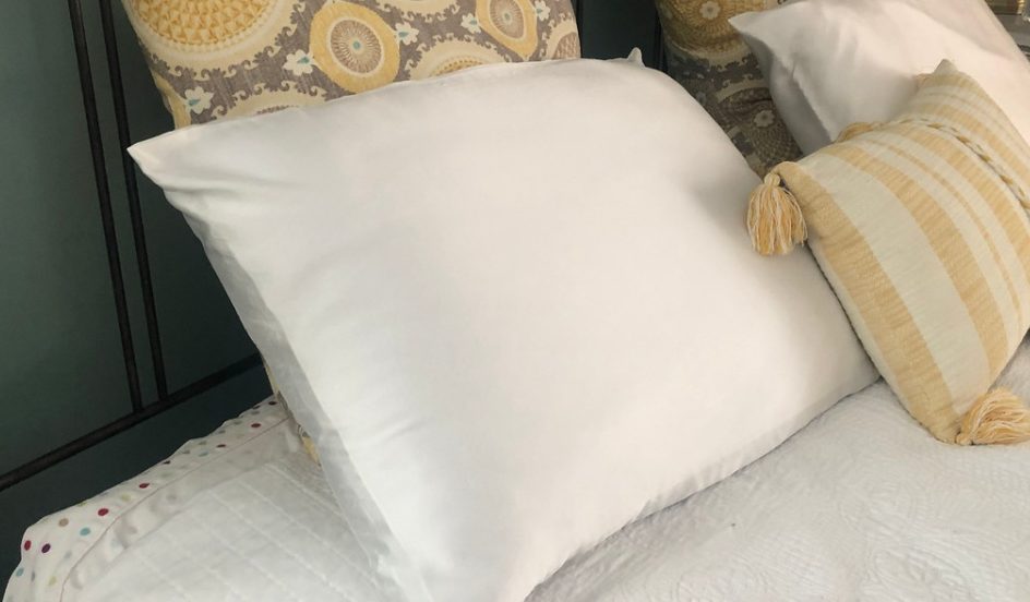 silk pillows on a bed