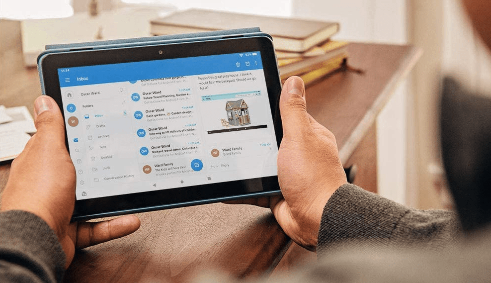 man holding a tablet