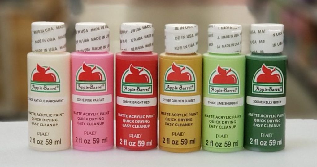 six small bottles of acrylic paint