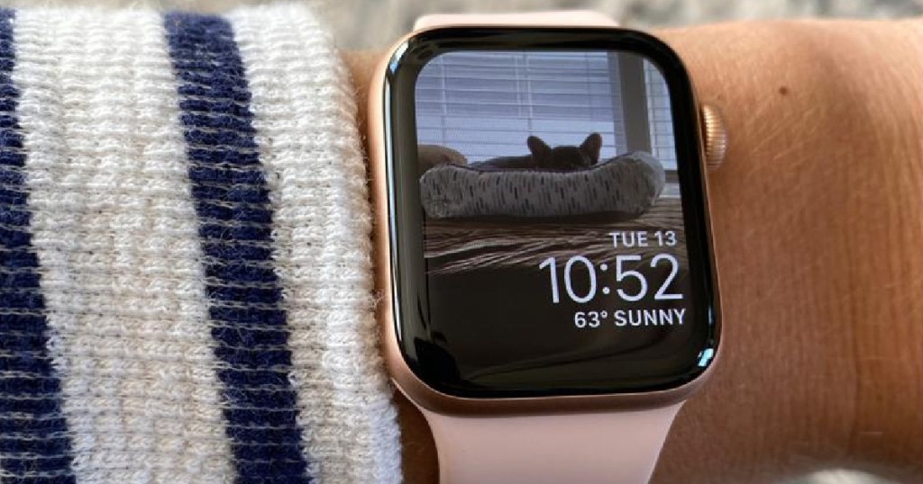 gold/pink smart watch on wrist