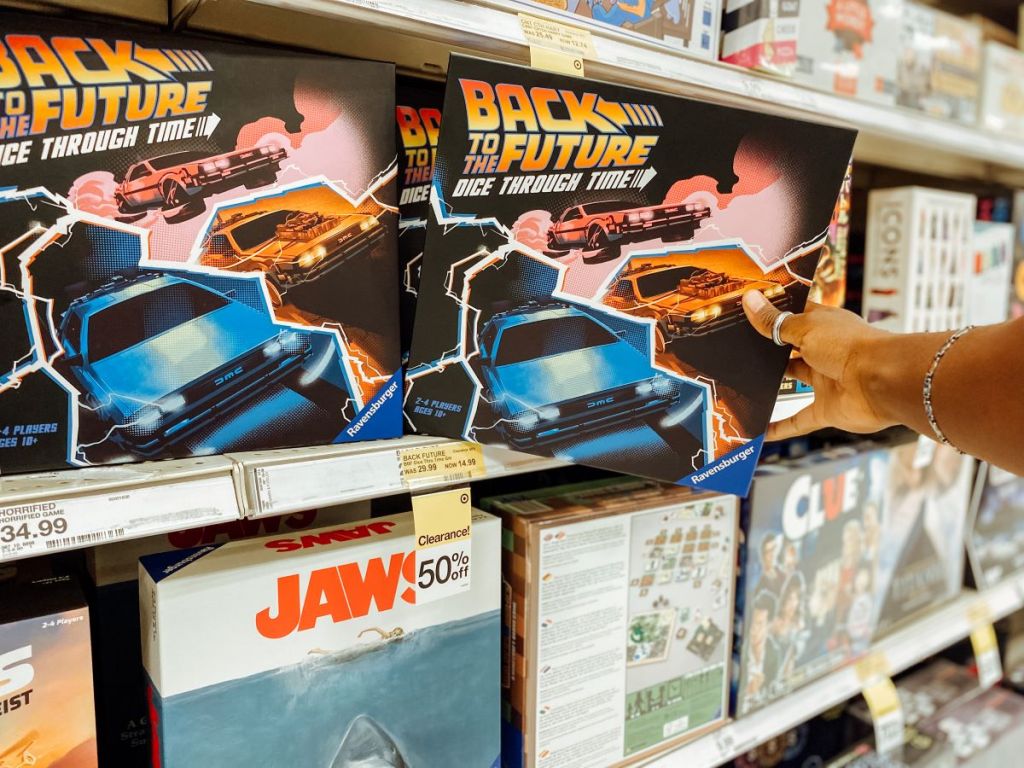 hand holding a Back to the Future Dice Through Time Board Game