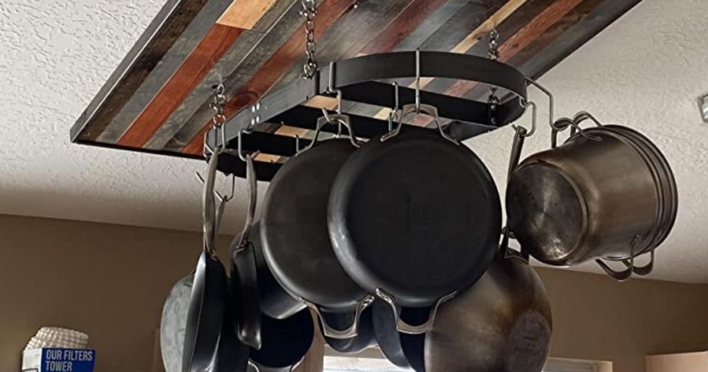 pots and pans hanging from a rack