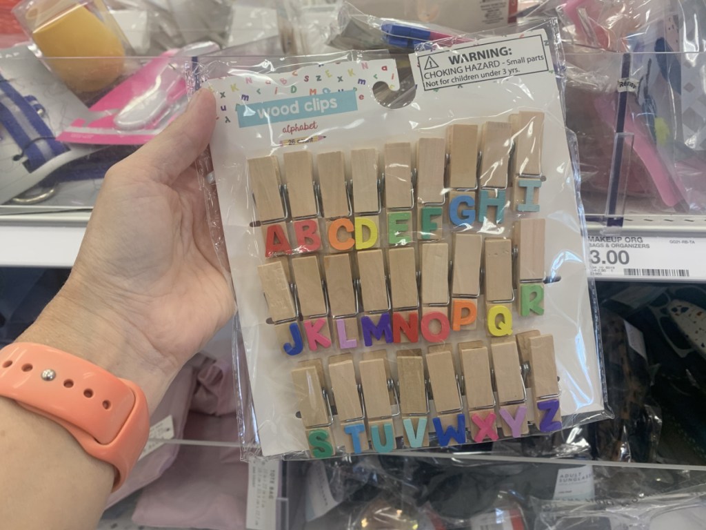 alphabet themed wooden clips in packaging