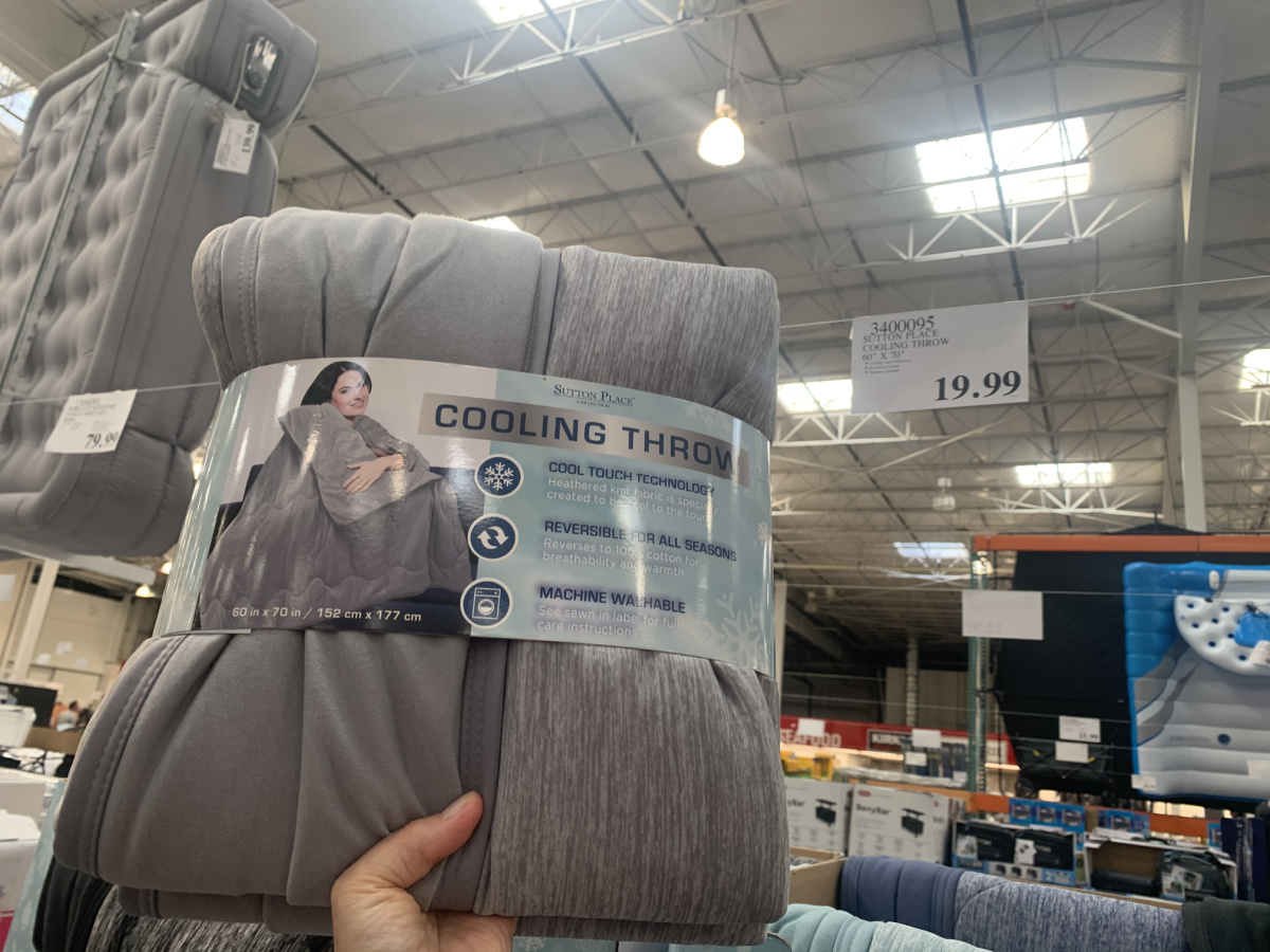 cooliong throw blanket in hand at costco