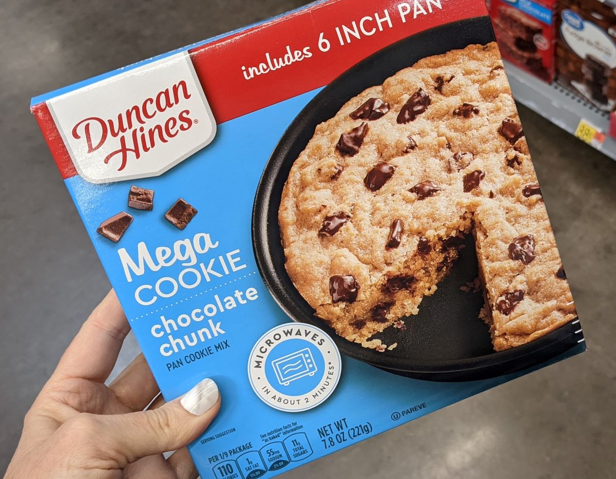 hand holding a Duncan Hines Mega Cookie