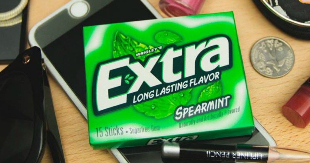 Extra Gum Spearmint on desk with phone