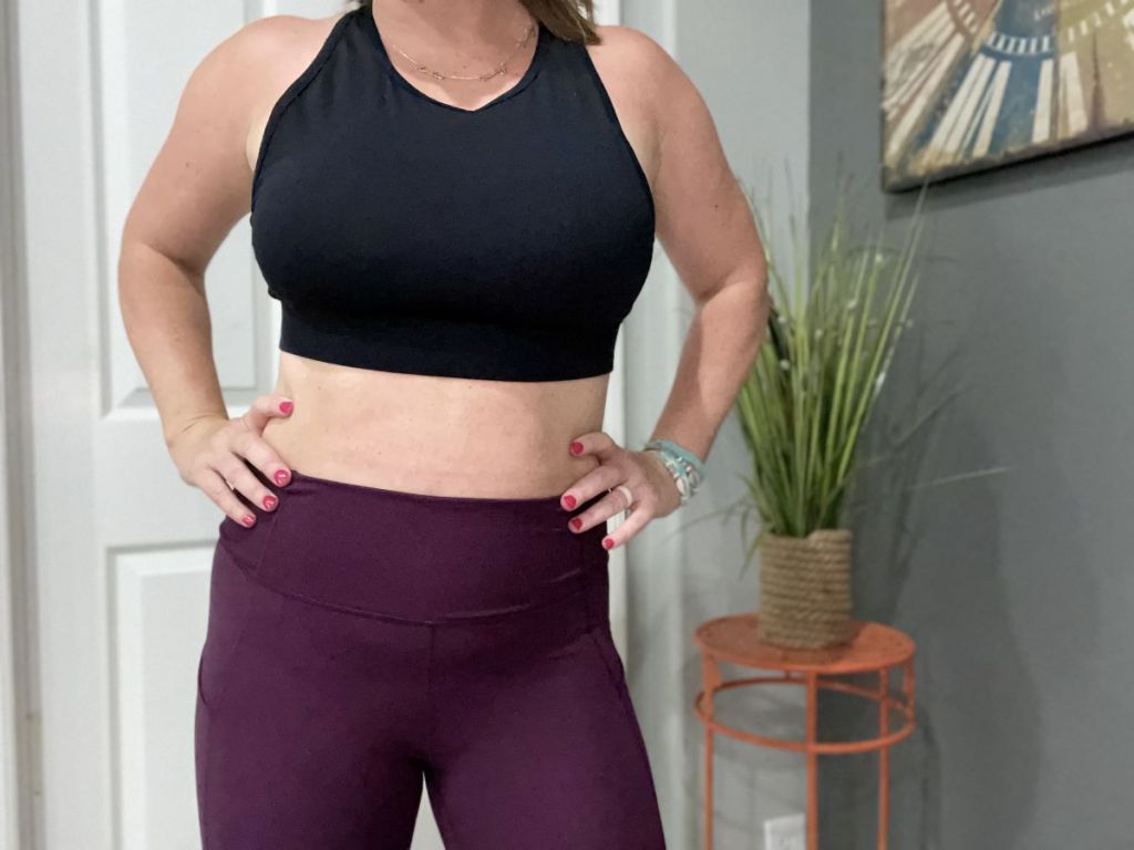 woman wearing a sports bra and leggings