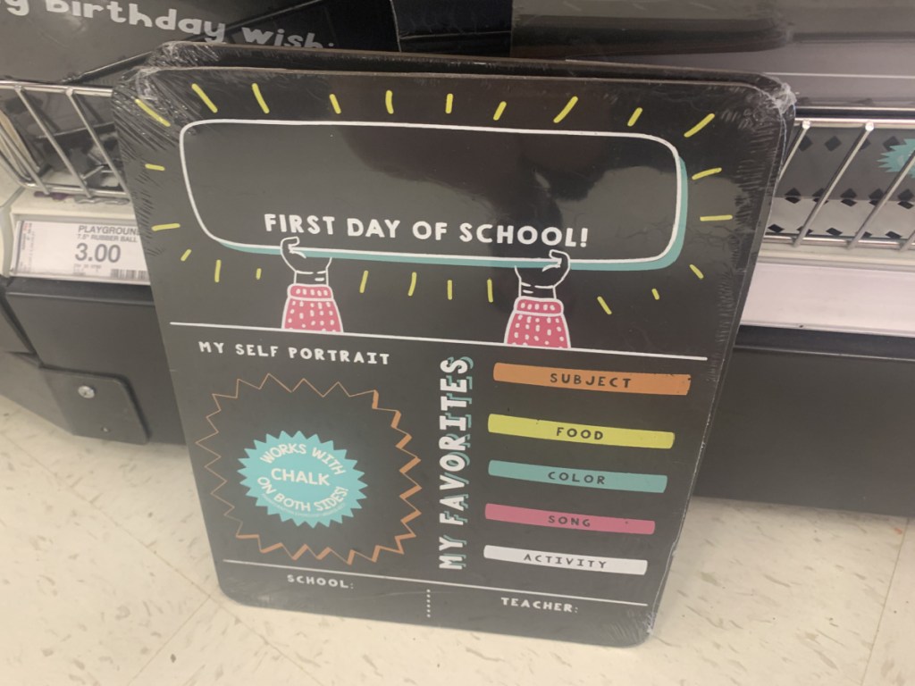 first day of school chalkboard near in-store display
