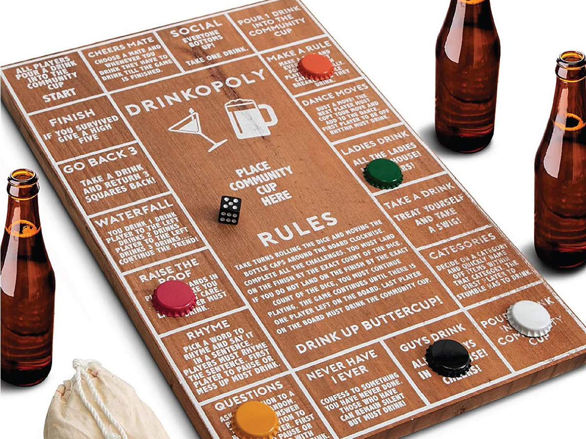 Hammer + Axe Wood Drinkopoly Board Game with beer around it