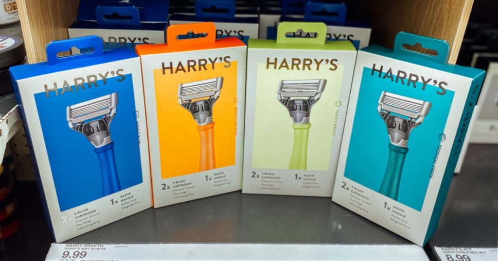 four razors on shelf 