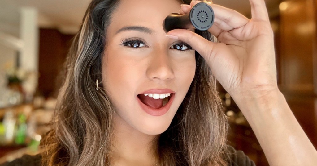 girl using revlon roller