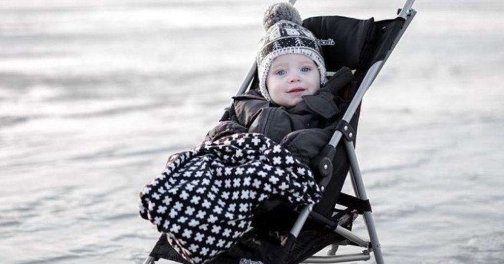 baby riding in a stroller