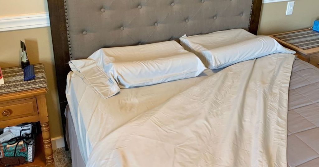 bed with sheets on it