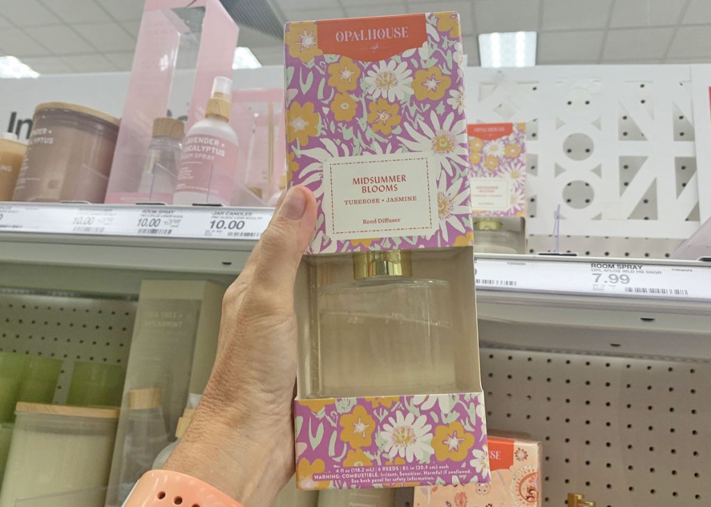holding up reed diffuser at target