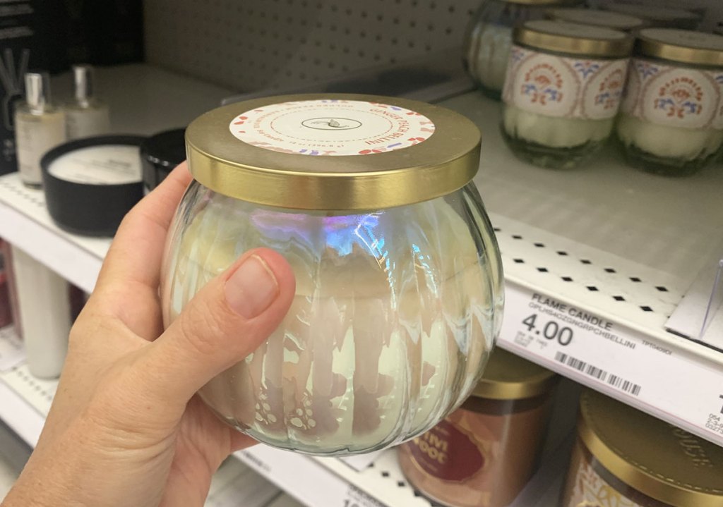 hand holding ribbed jar candle at target
