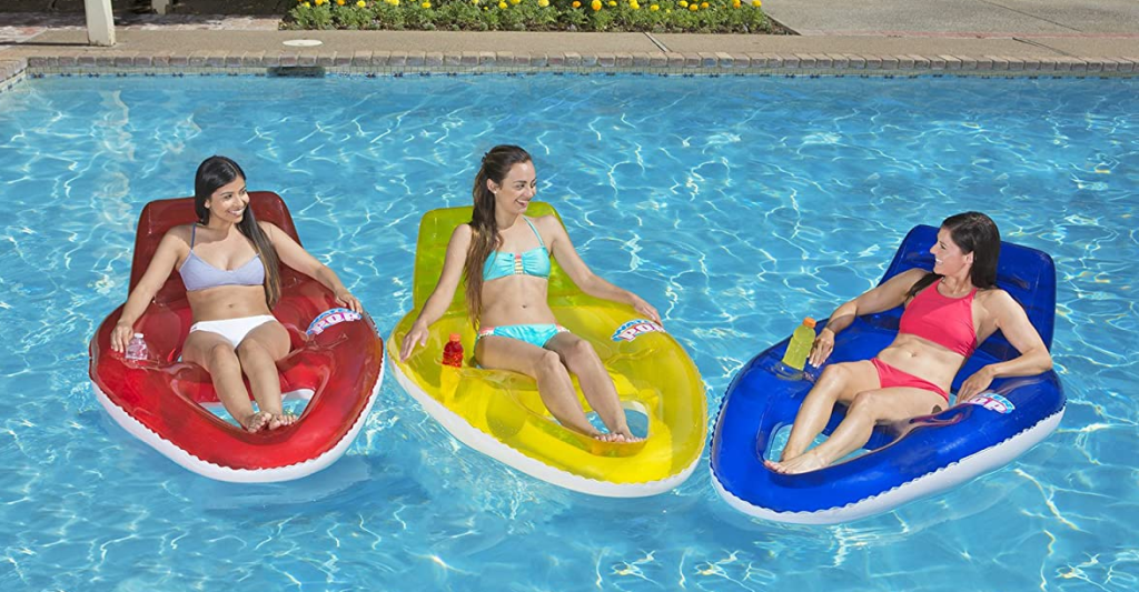 three people on pool floats
