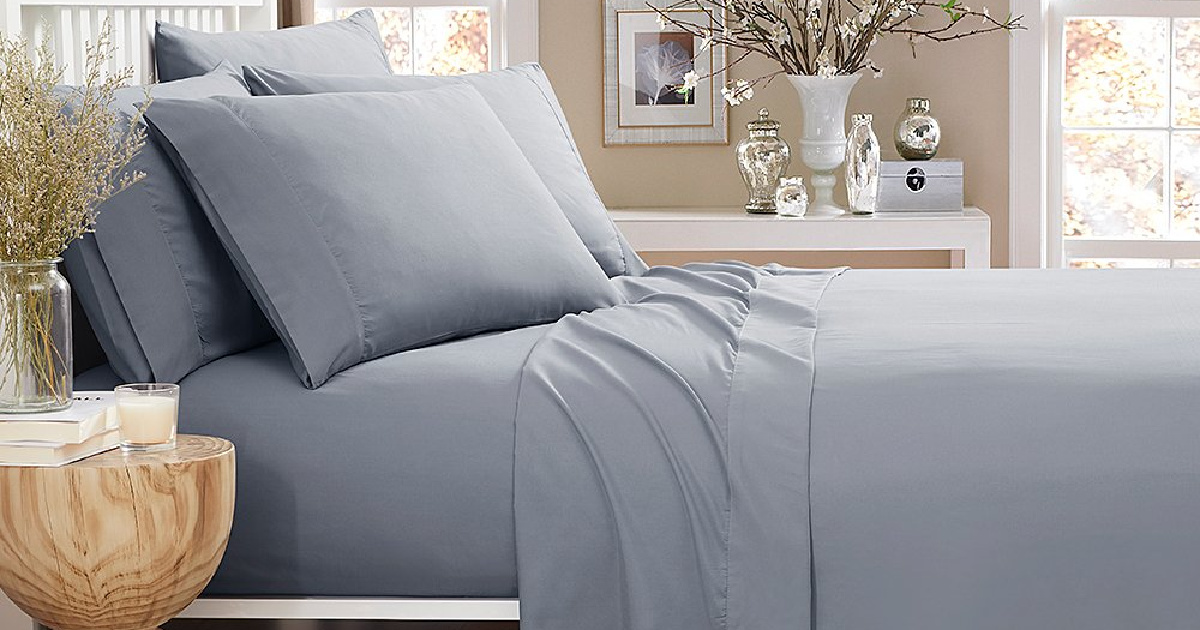 bed with gray sheets