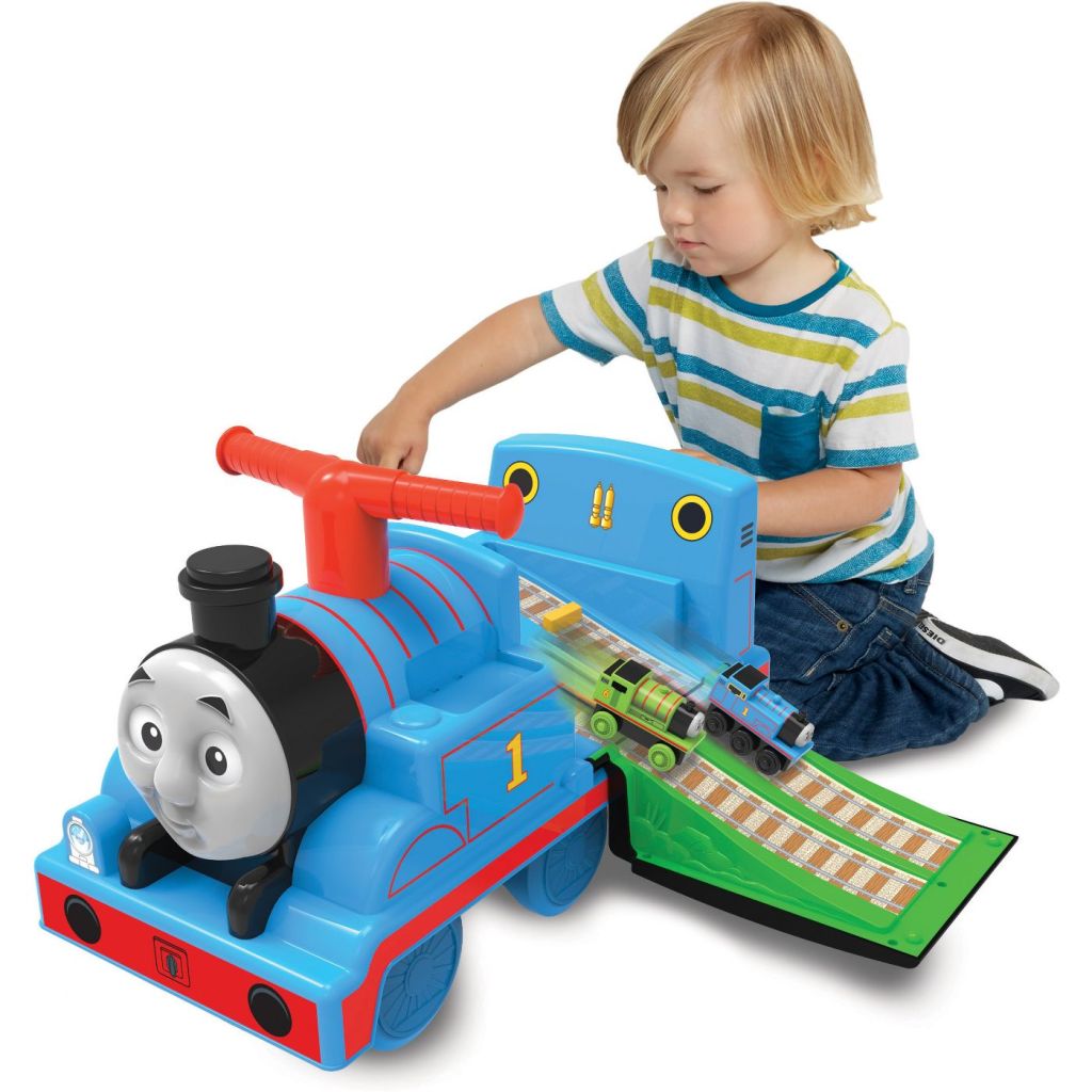 Toddler playing with Thomas Ride On