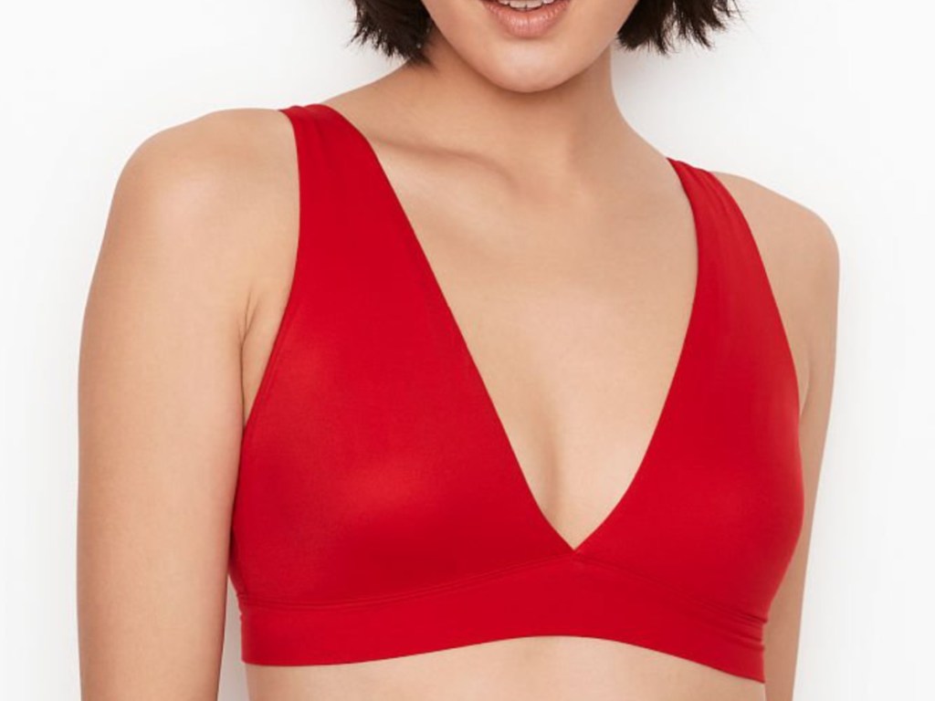 woman wearing a red victoria's secret bra