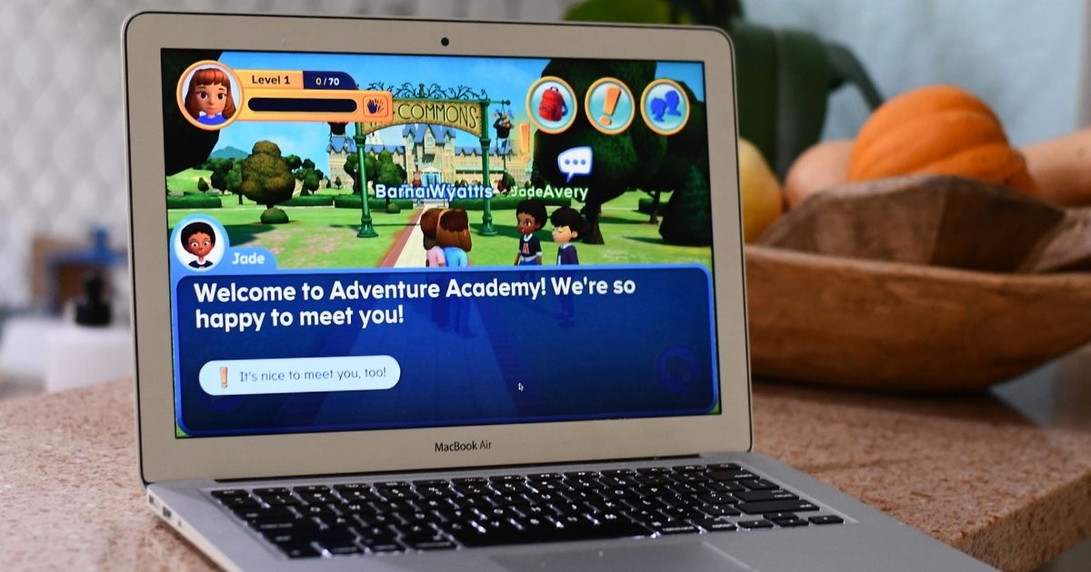 Laptop screen showing Adventure Academy home page