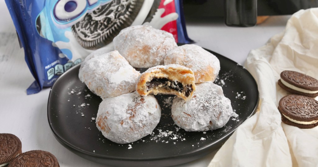 air fried oreos on a plate with powdered sugar