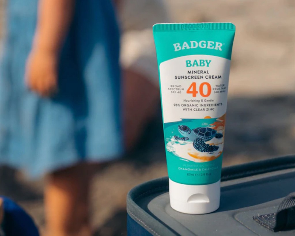 tube of badger baby mineral sunscreen on table outside