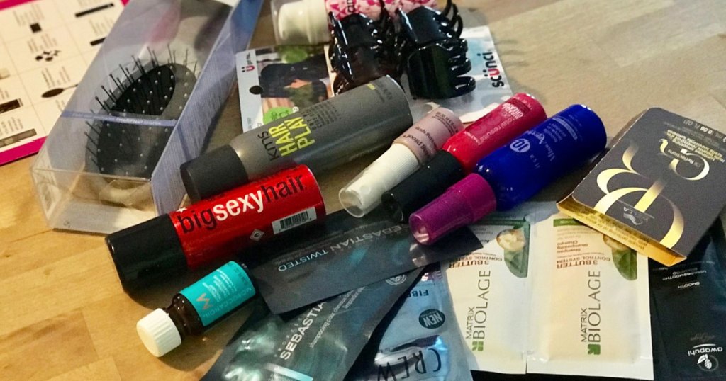beauty brands discovery box products spread out on table