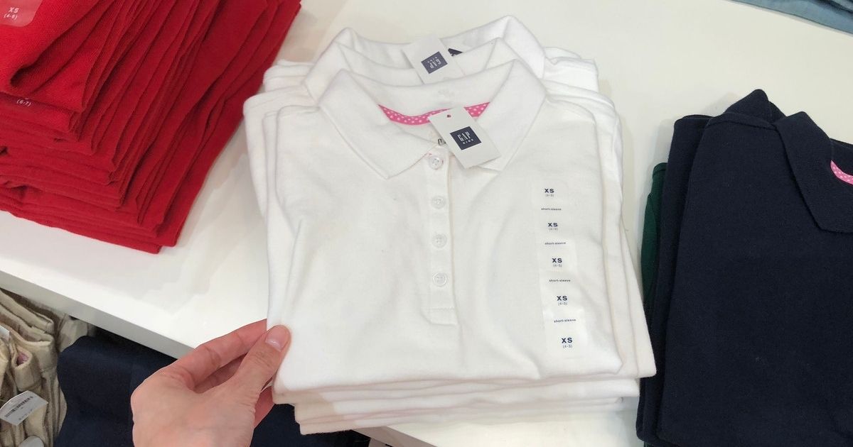 white GAP polo on display in store