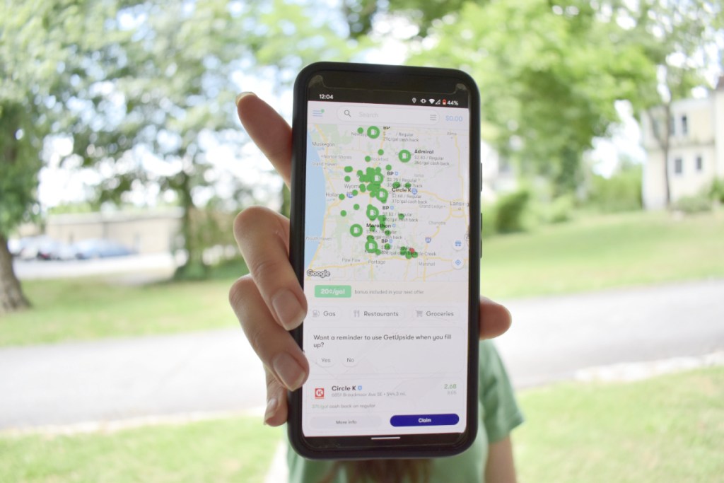 hand holding phone with gps app