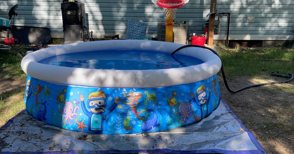 colorful inflatable pool in backyard
