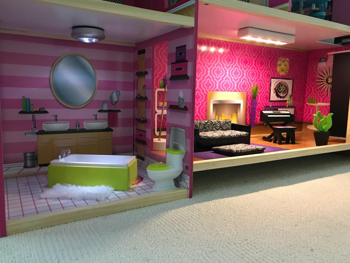 rooms in dollhouse featuring furniture