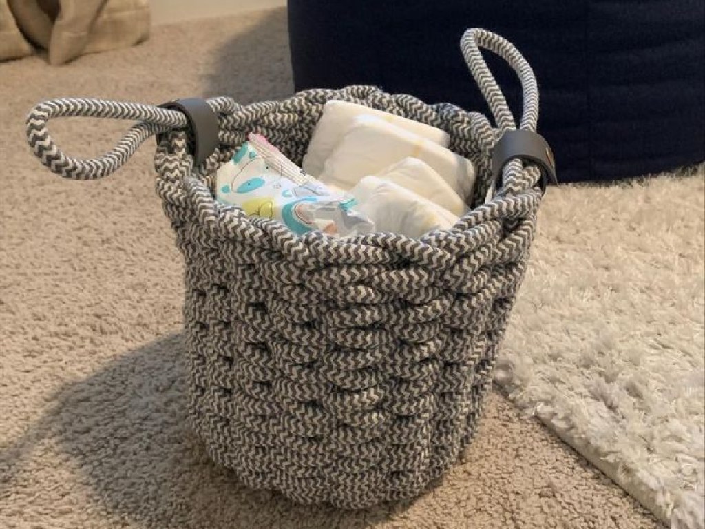 basket holding diapers and wipes