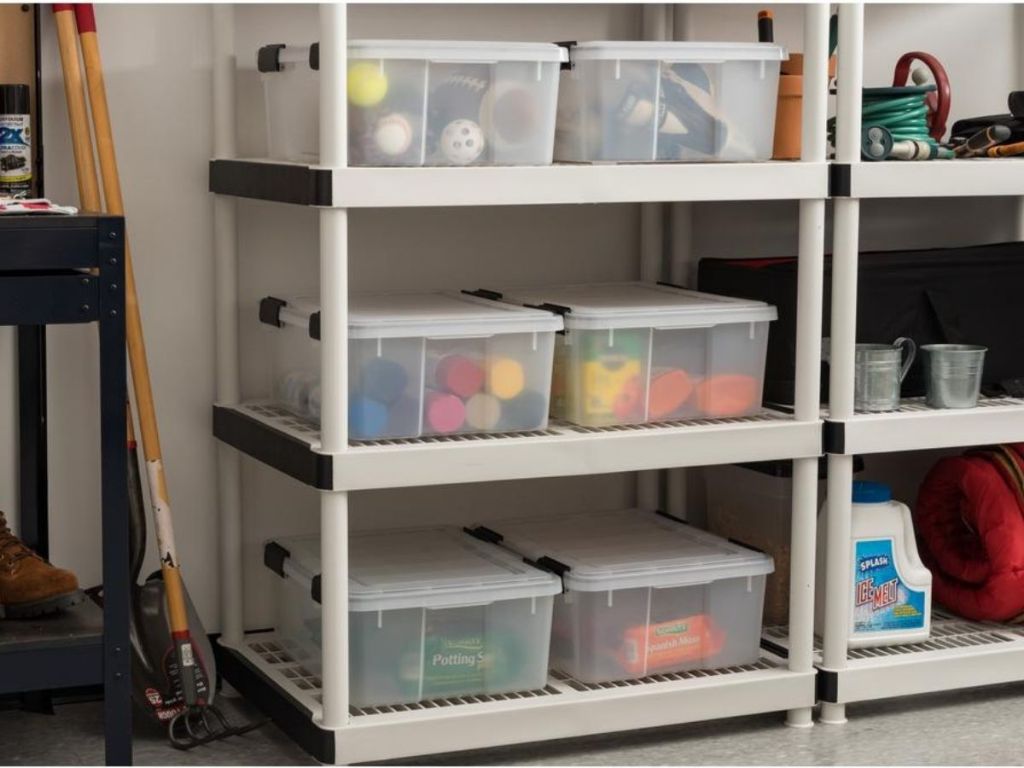 clear stacking bins with tops in garage