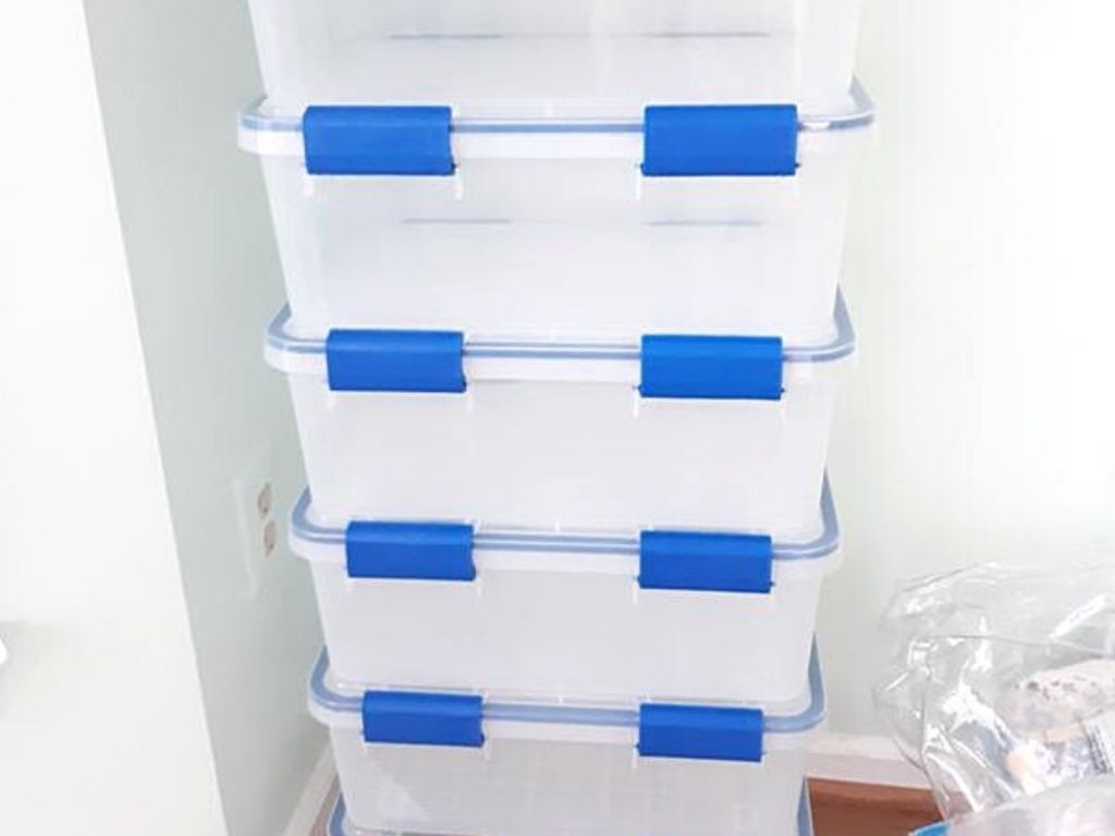 clear and blue stacking bins