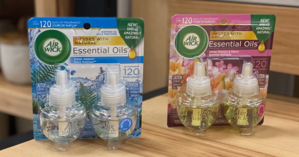 two packs of Air Wick scented oil refills