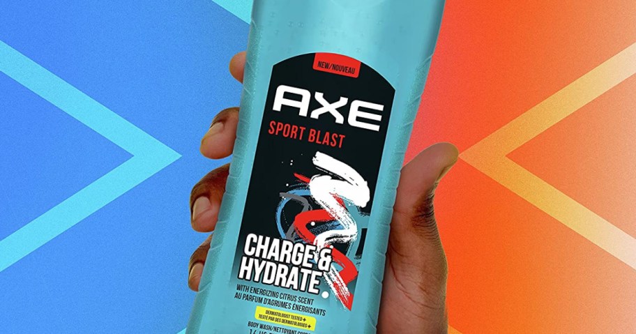 hand holding an Axe Charge & Hydrate Body Wash bottle with a multi color background