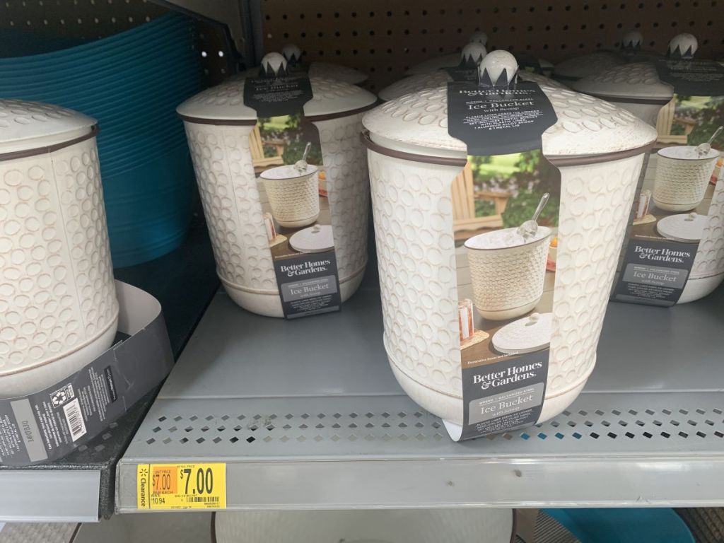 row of ice buckets on a shelf at Walmart