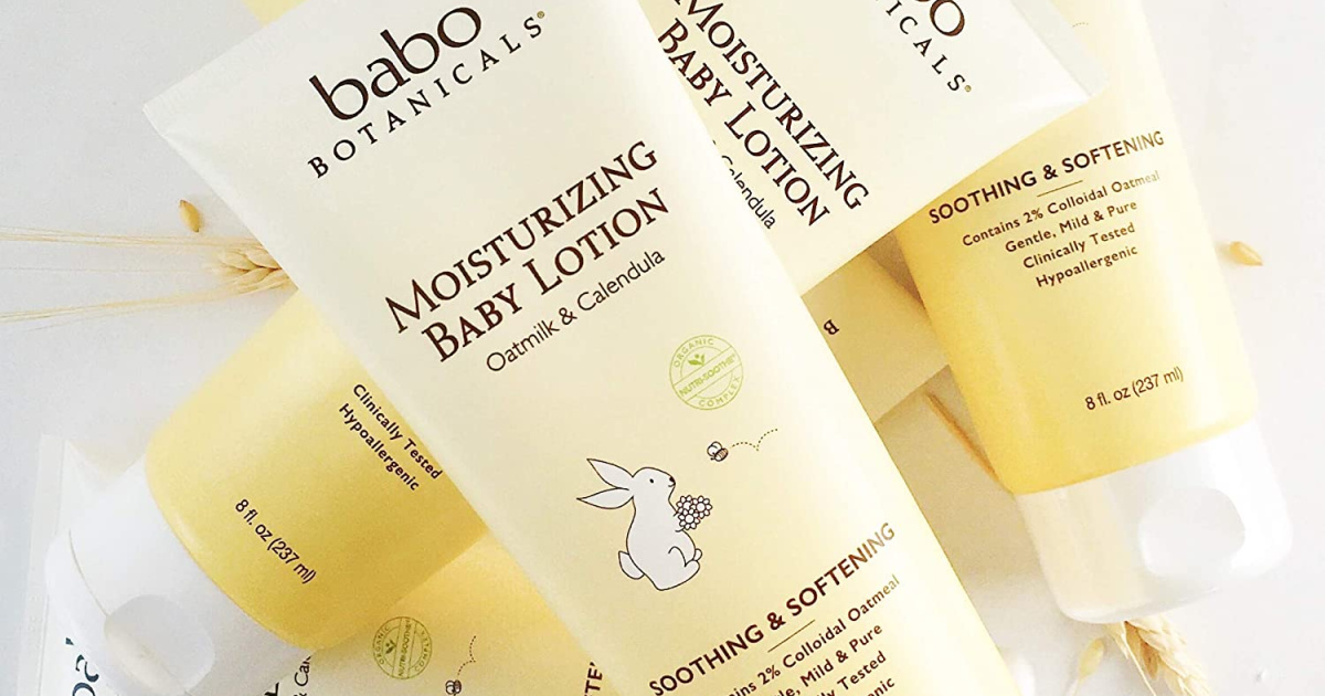 bottles of baby lotion stacked across each other