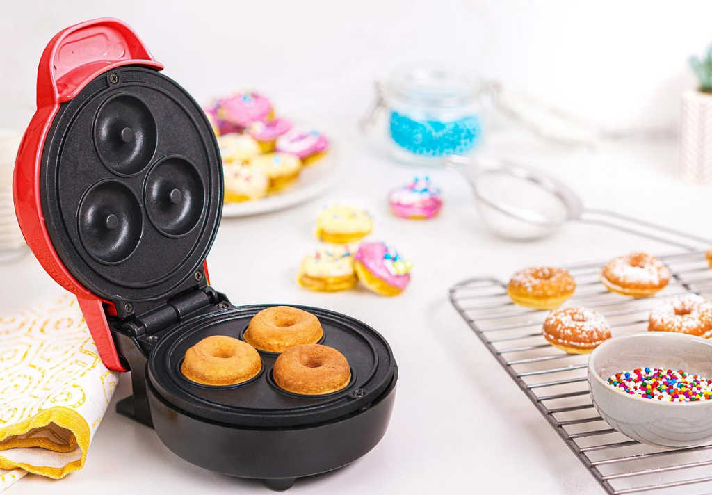 mini donut maker with mini donuts by it