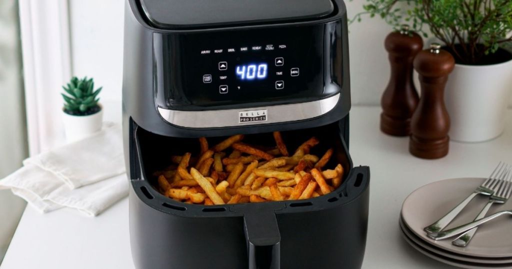 air fryer with fries in it