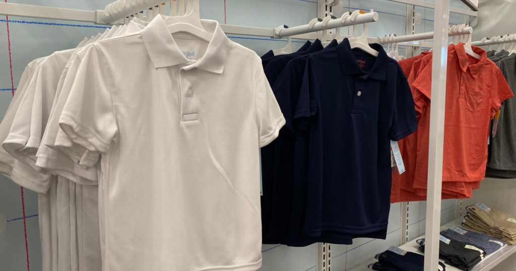 white and black polo shirt on rack