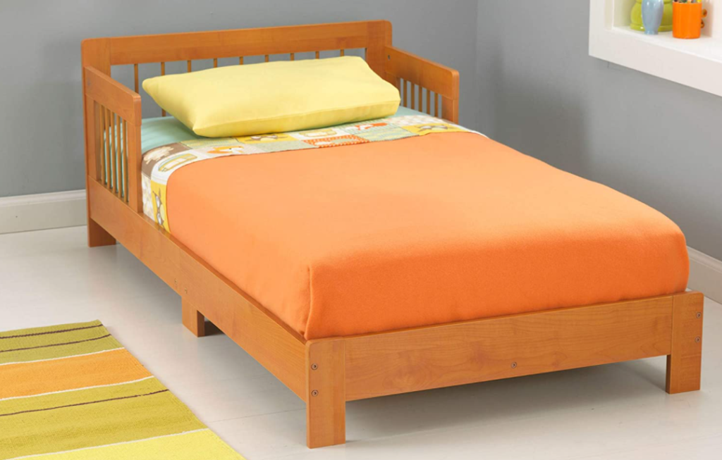 kids bed with orange bedding