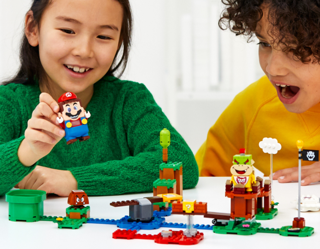 kids playing with a LEGO set