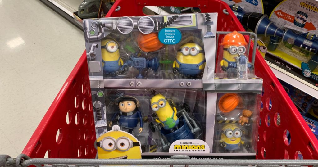 yellow toy figures in front of cart 