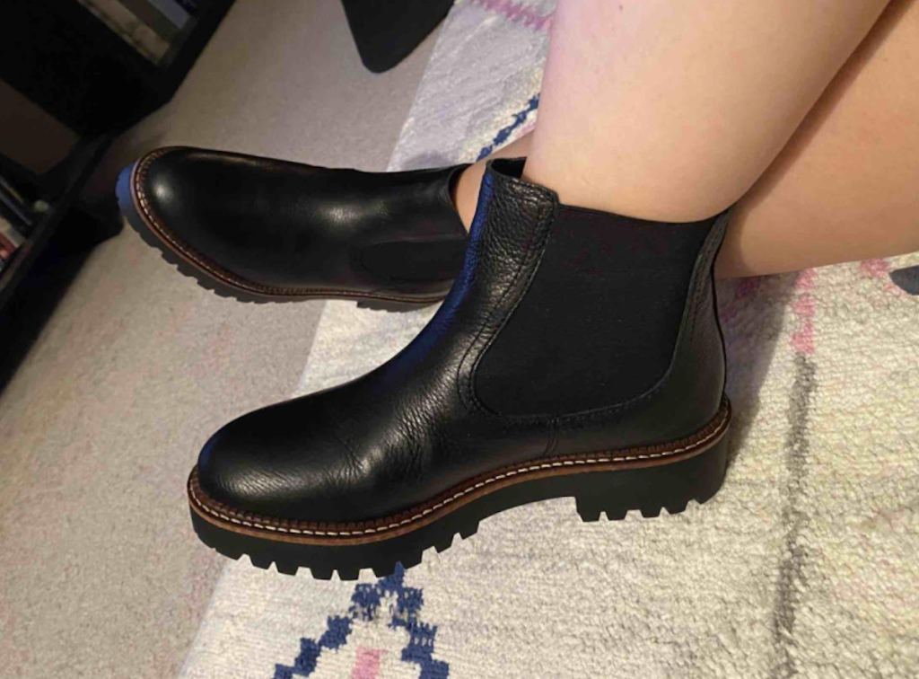 close up of feet wearing chunky black leather boots in nordstrom anniversary sale