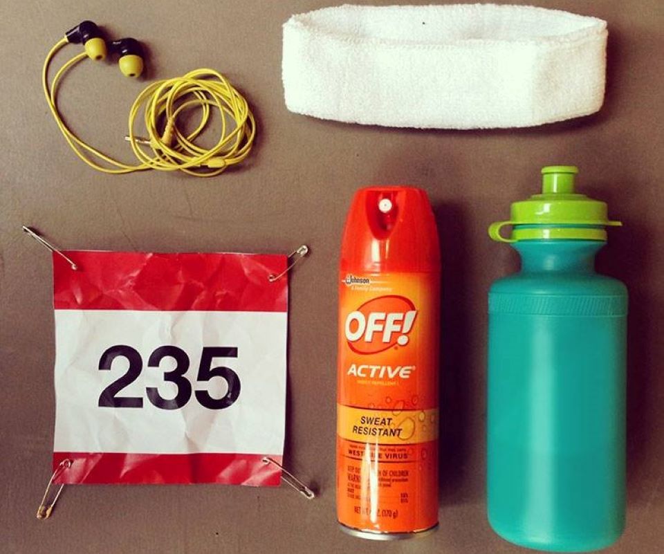 bug spray, runners number, headband and water bottle