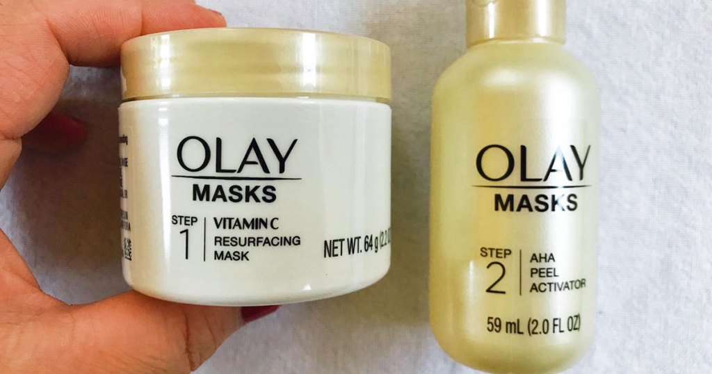 hand holding two step olay mask set