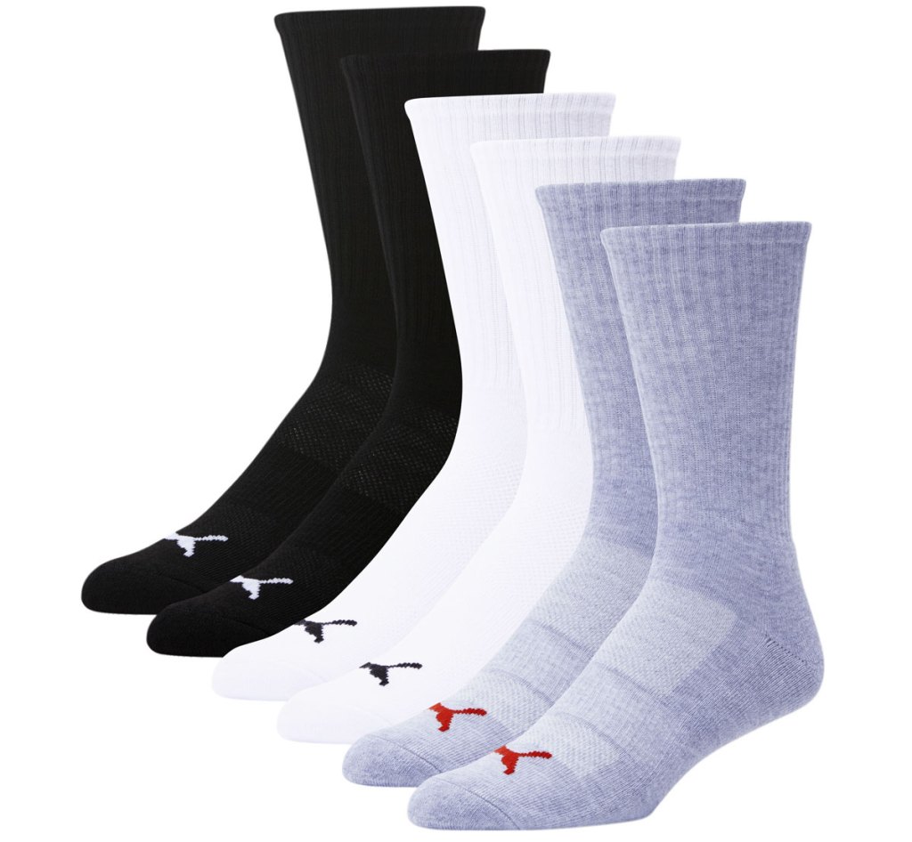 grey, white, and black pairs of puma crew socks